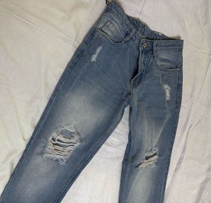 Distressed Blue Denim Jeans