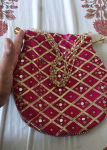 magenta pink potli bag