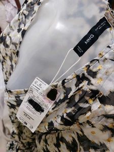 Formal floral blouse with gold shimmers