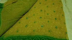 Beautiful yellow and green saree