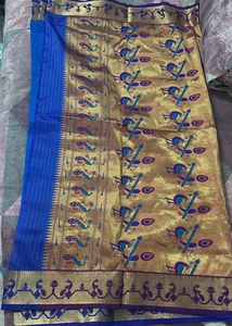 Vibrant Blue Silk Saree with Peacock Motif