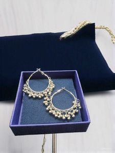 Silver Hoop Earrings with Dangling Charms