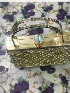 Elegant Beaded Silver Clutch