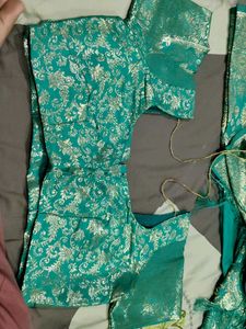 Elegant Teal Saree with Gold Embroidery