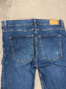 Blue Distressed Denim Jeans
