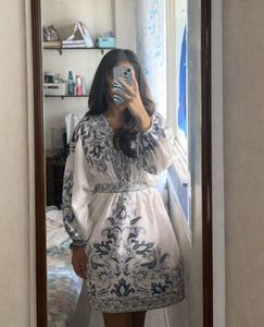 Elegant White Embroidered Gown