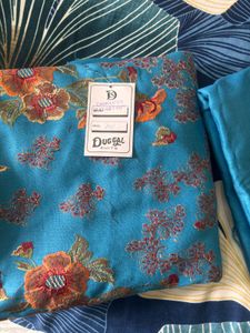 Beautiful Teal Embroidered Dress Material