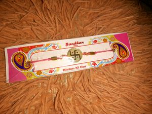Resin Rakhi with Pearl Beads