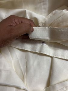 Elegant Cream Saree with Golden Border