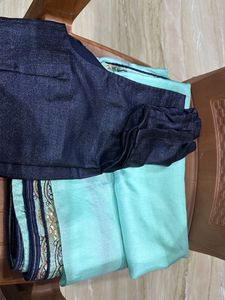 Elegant Teal Saree with Intricate Border