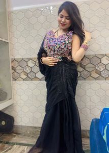 Elegant Black Saree with Floral Blouse