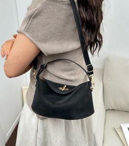 Chic Black Shoulder Bag with Gold Hardware