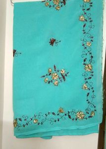 Elegant Turquoise Embroidered Saree