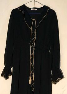 Black Abaya with Cream-colored Ruffle Trim