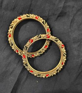 Silver tone Bangles: Red and green details.
