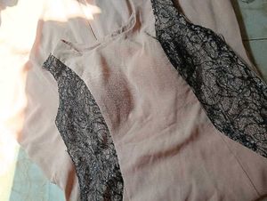 Elegant Peach Gown with Black Lace Detail
