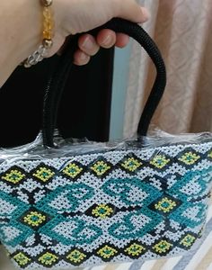 Exquisite Beaded Handbag with Geometric Pattern