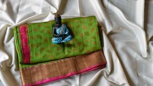 Vibrant Green Saree with Pink Border