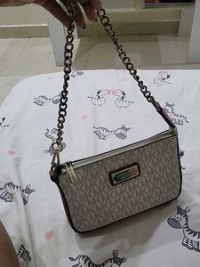 Michael Kors Monogram Clutch
