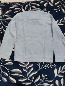 Light Blue Denim Jacket with Unique Trim