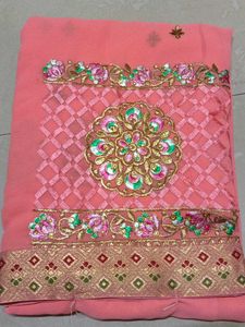 Beautiful Embroidered Peach Saree