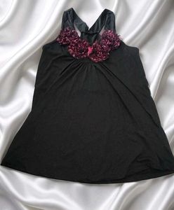 Chic Black Tank Top with Floral Embellishment