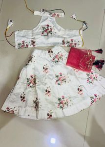 Elegant White Lehenga Choli with Pink Floral Embro