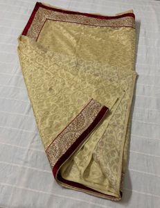 Festive Cream Saree with Red Blouse