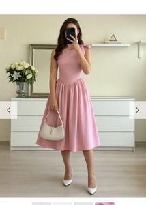 Elegant Pink Midi Dress with Bow Detail