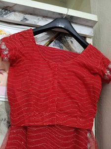 Stunning Red gand stone work saree with blause net