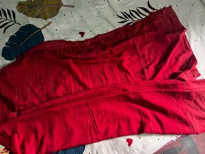 Vibrant Red Saree with Golden Accents