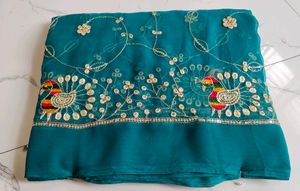 Exquisite Teal Peacock Embroidered Saree