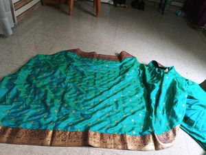 Elegant Teal Silk Saree with Gold Embroidery