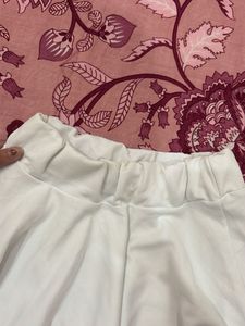 White Pleated Skirt with Black Stripes