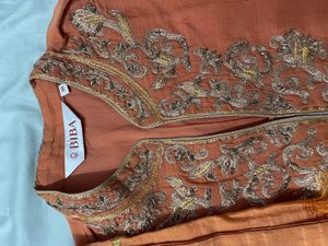 Elegant Orange Embroidered Kurta Set
