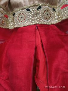 designer red and cream gown
