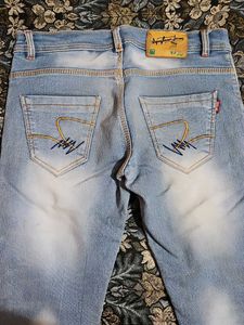 Light Wash Distressed Denim Jeans