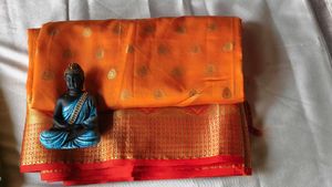 Elegant Orange Silk Saree with Golden Zari