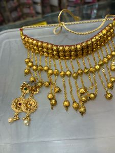 Exquisite Gold Necklace with Intricate Beads