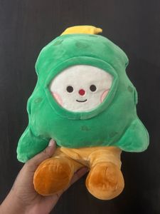 Christmas tree character wearing a green hooded