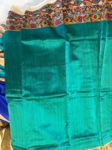 Elegant Teal Saree with Intricate Embroidery