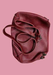 Original Flaunt Unused Maroon Sling bag