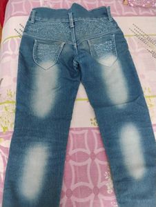 Distressed Blue Denim Jeans