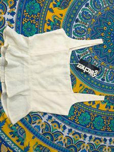 Cream Peplum Button-Up Top