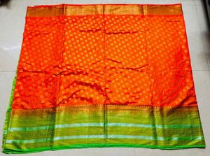 Vibrant Orange Silk Saree with Green Border