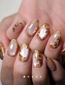 Elegant Gold Leaf Nail Art