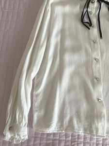 Chic White Blouse with Black Ribbon Detail🤍