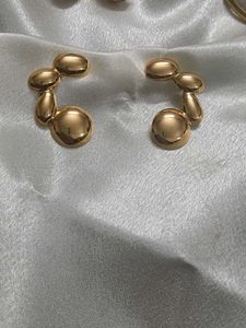 Gold Tone Abstract Earrings