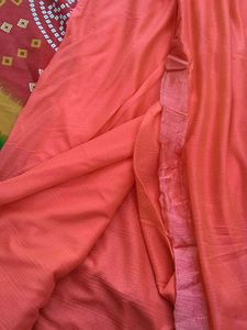 Elegant Coral Saree with Ruffle Detail