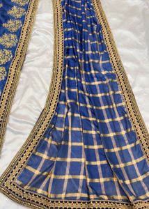 Elegant Blue & Gold Checkered saree